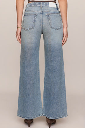 The Stunner Mid Rise Wide Leg Denim