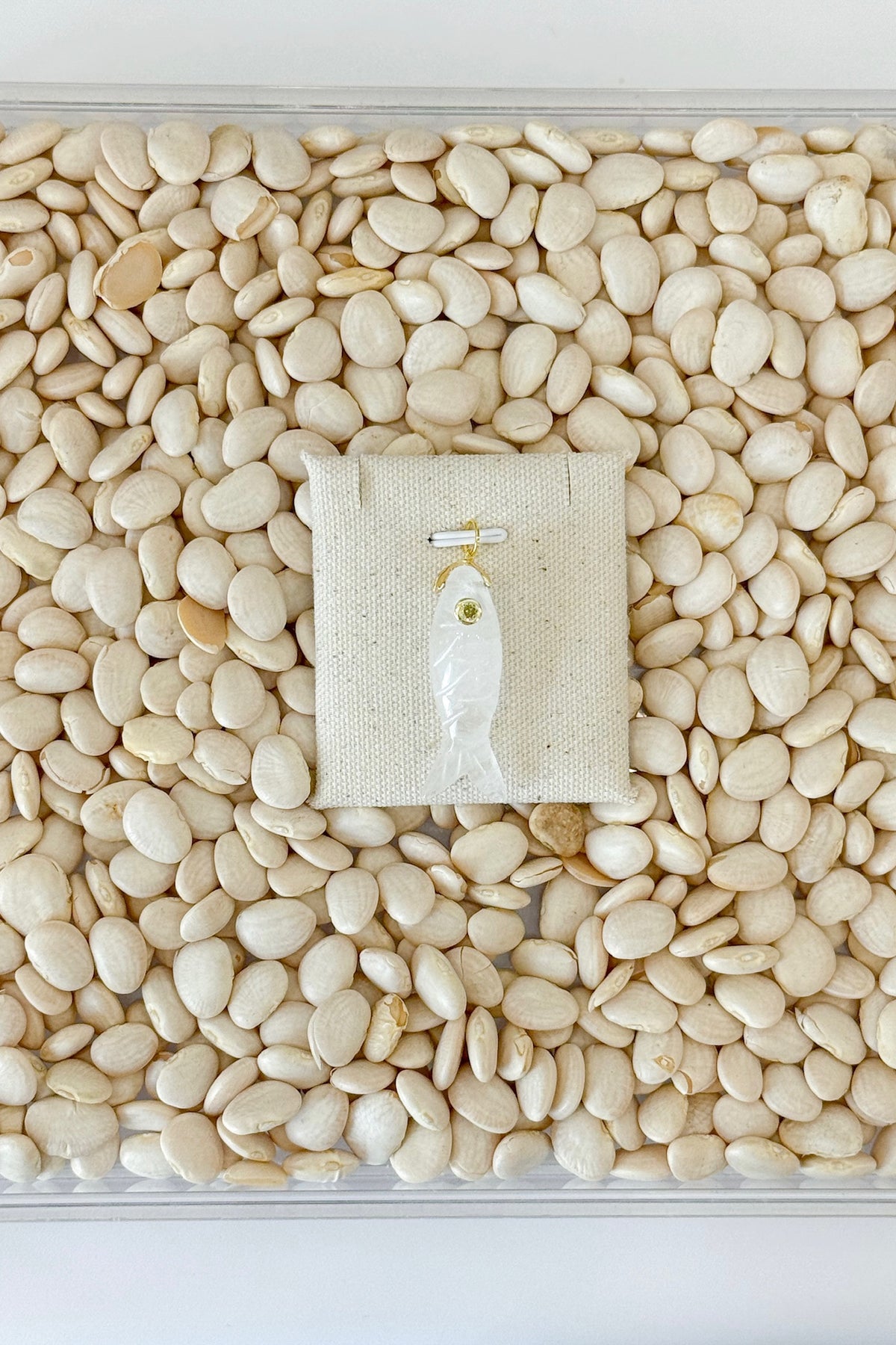 White Stone Fish Charm
