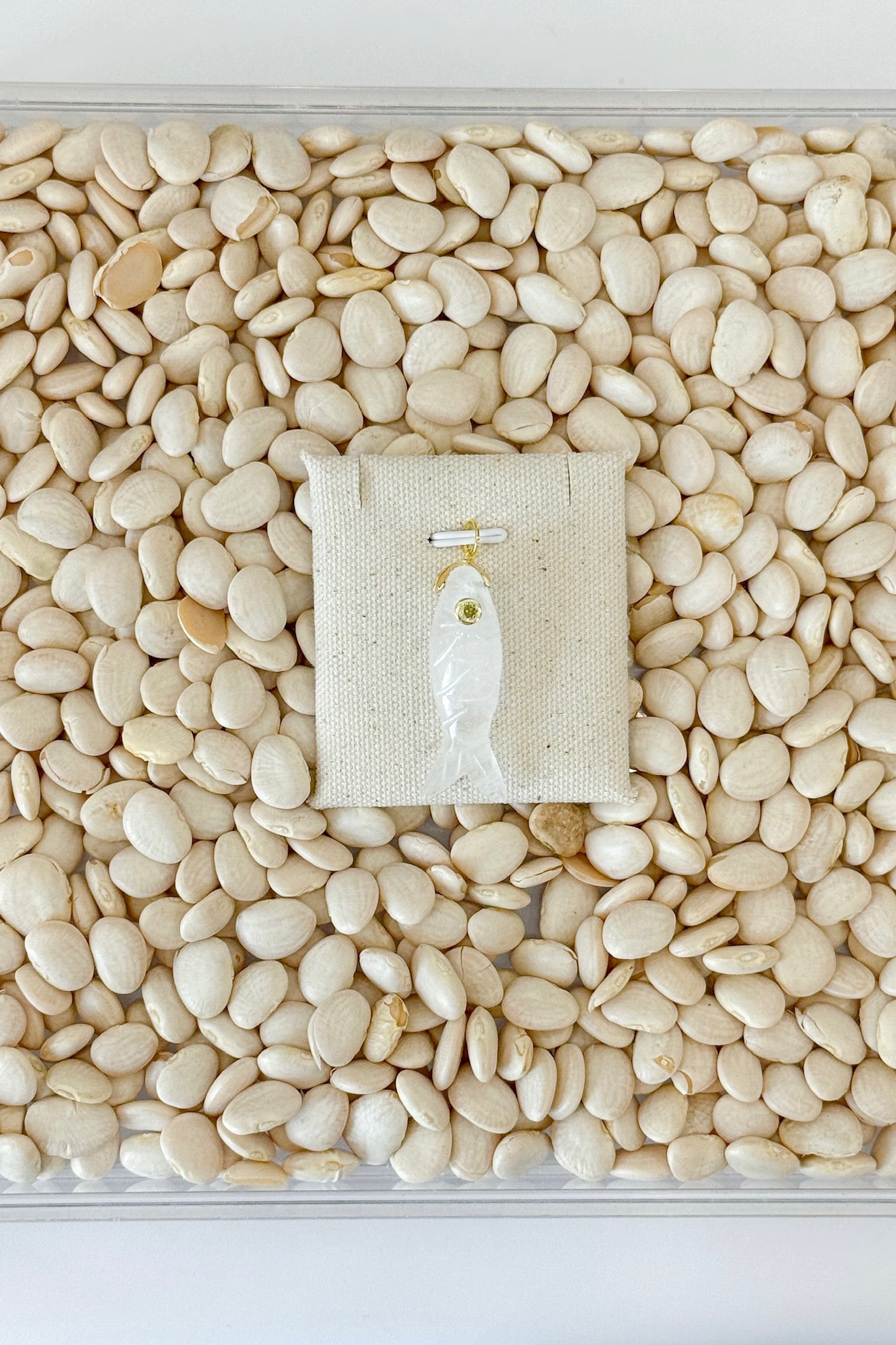 White Stone Fish Charm